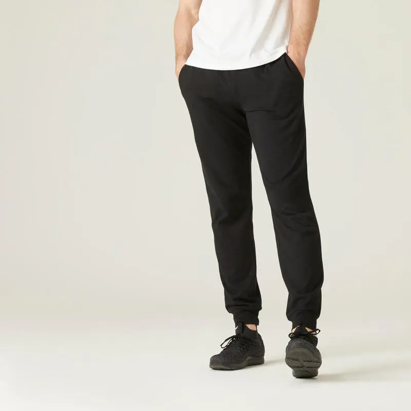 Pantal贸n Ch谩ndal Fitness Algod贸n Recto Hombre Domyos 120 Negro