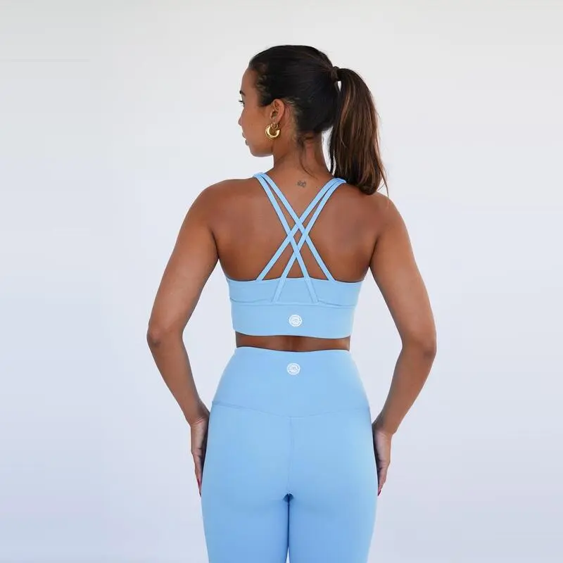 Top Deportivo Fitness Sostenible Poliéster Mujer Fitplanet Dolphin Azul Claro - Imagen 4